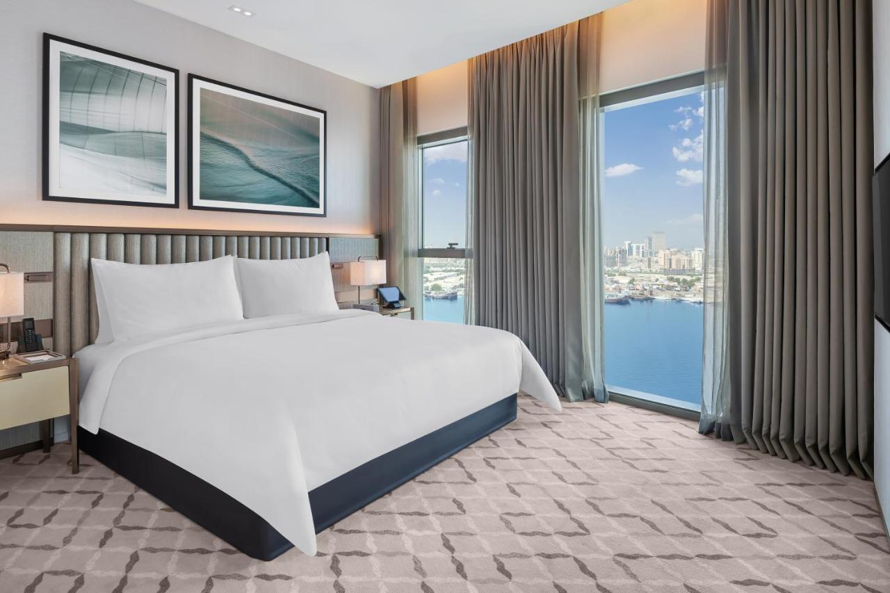 Address Creek Harbour Hotell Dubai Exteriör bild A bedroom at the hotel