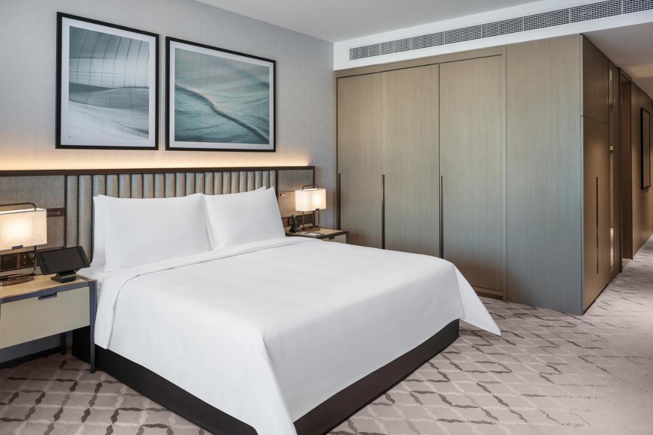 Address Creek Harbour Hotell Dubai Exteriör bild A bedroom at the hotel