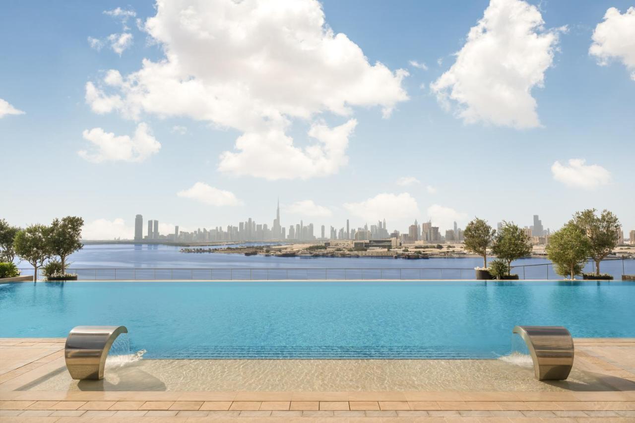 Address Creek Harbour Hotell Dubai Exteriör bild View of Dubai from the pool